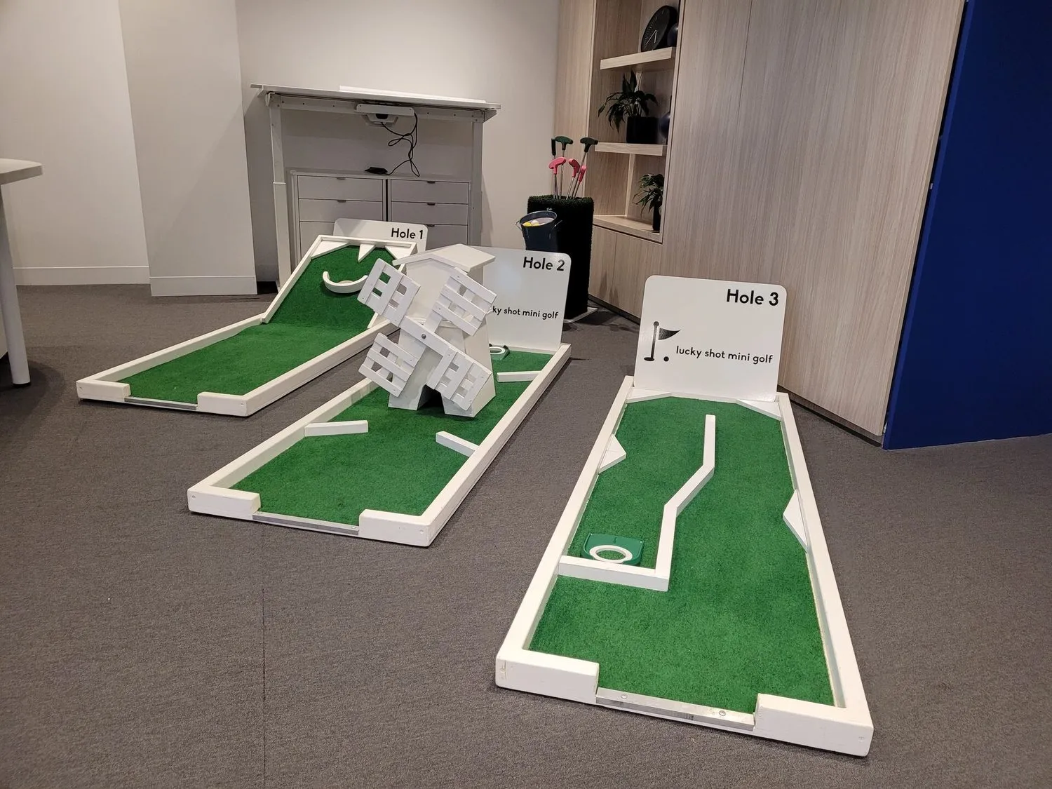 Lucky Shot three-hole mini golf setup installed in a modern Melbourne corporate office